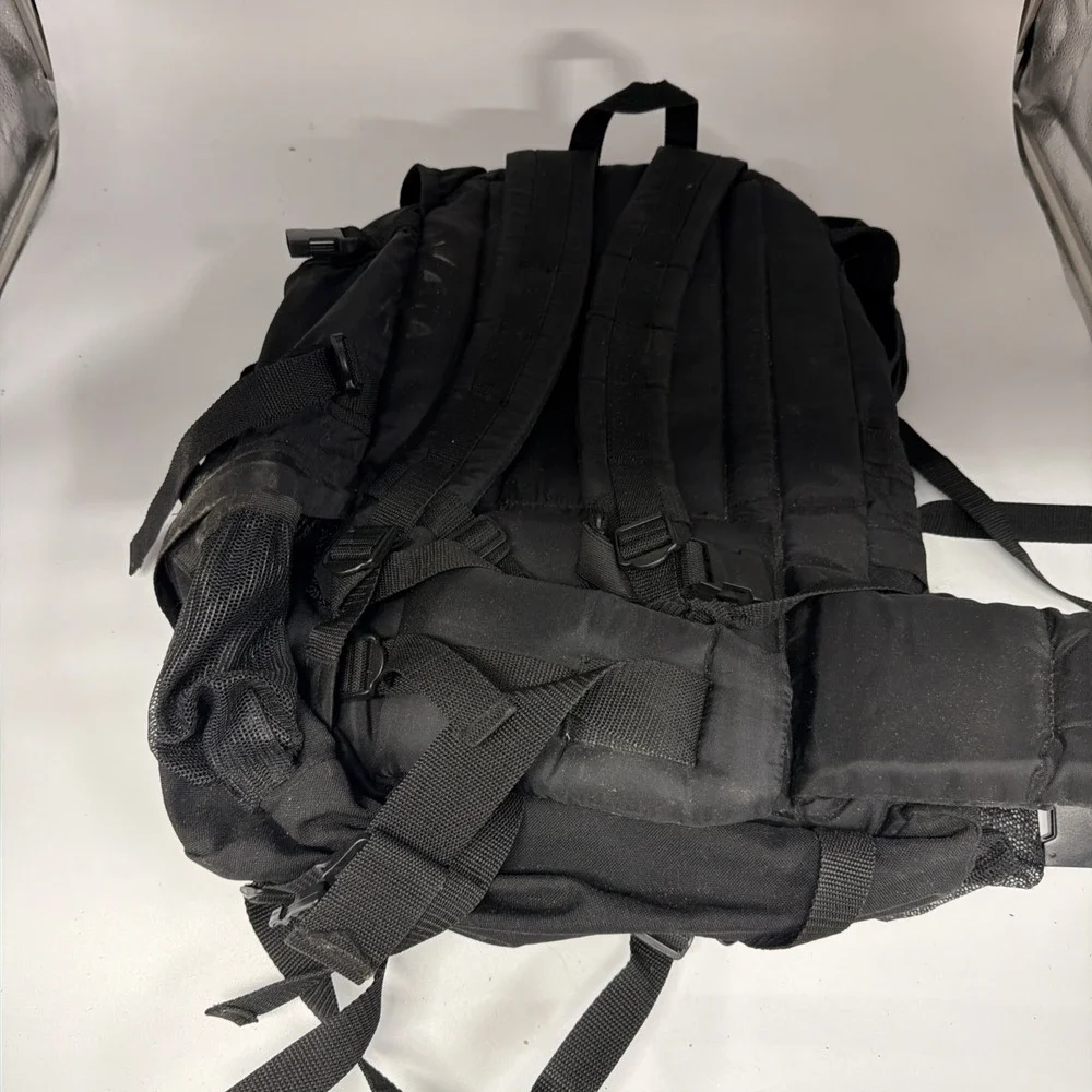 black Stansport hiking backpack features external adjustable straps